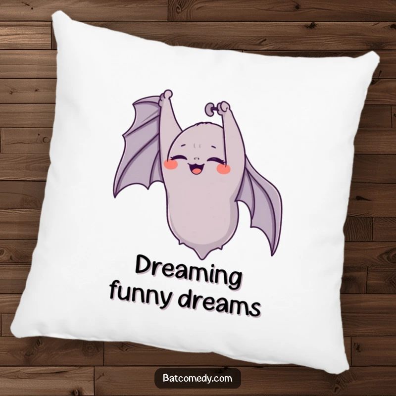 Funny bat pillow featuring an upside-down bat giggling with eyes closed, designed for comfort and spreading infectious cheer.
