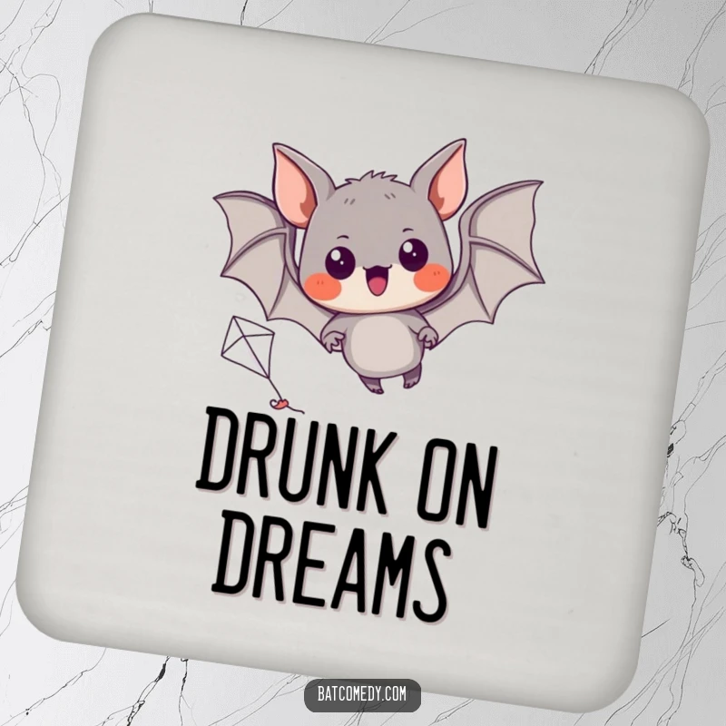 Funny drink coaster featuring a black bat with excited eyes, attempting to fly a miniature kite.
