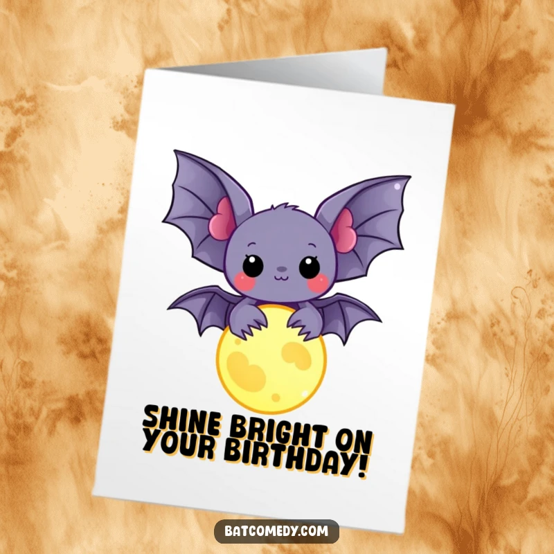 Free Printable Birthday Card: A cute kawaii bat gently holds a glowing moon charm, radiating warmth and birthday wishes under the night sky.