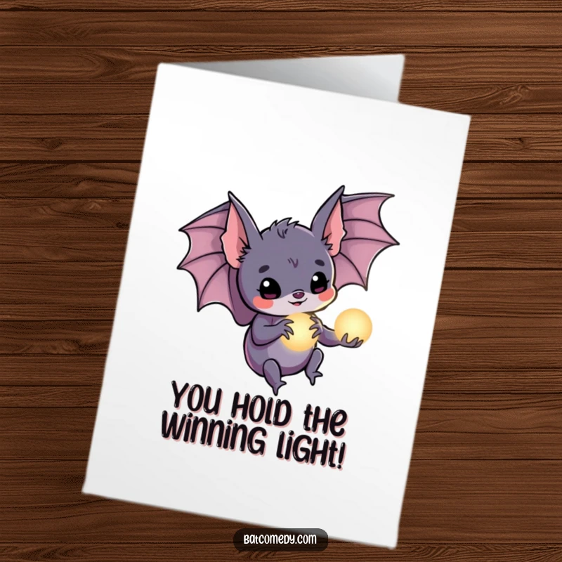 Funny Free Printable Congratulations Card: A bat carefully holds a tiny glowing orb, symbolizing the bright future ahead after your success.