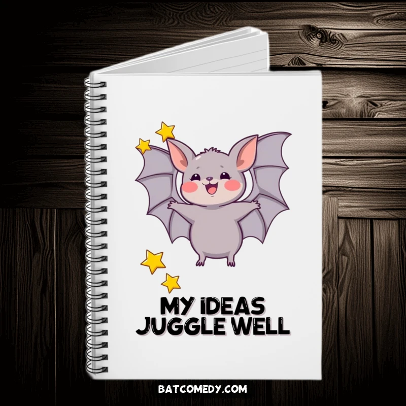Funny notebook with a bat excitedly juggling three tiny stars with its wings, ideal for jotting down celestial ideas.
