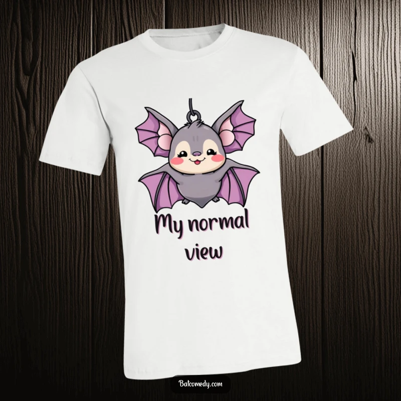 Funny kawaii bat with a huge silly grin hanging upside down, exuding a carefree and humorous vibe on a t-shirt.
