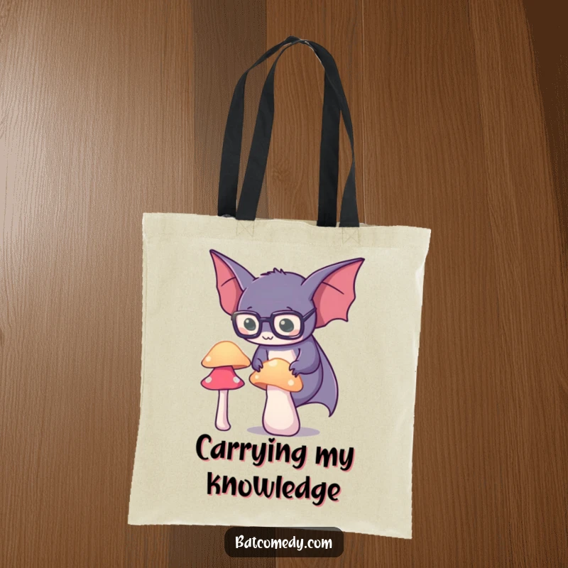Funny spectacled bat tote bag shows a bat wearing glasses, focused on a glowing mushroom, perfect for carrying treasures.